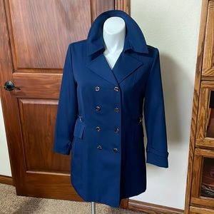 Vintage short trench coat. See measurements for sizing